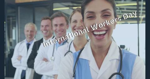 Smiling Medical Team Celebrating International Workers Day at Clinic