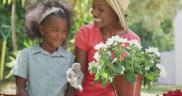 African American Mother and Daughter Gardening Together Outdoors - Download Free Stock Images Pikwizard.com