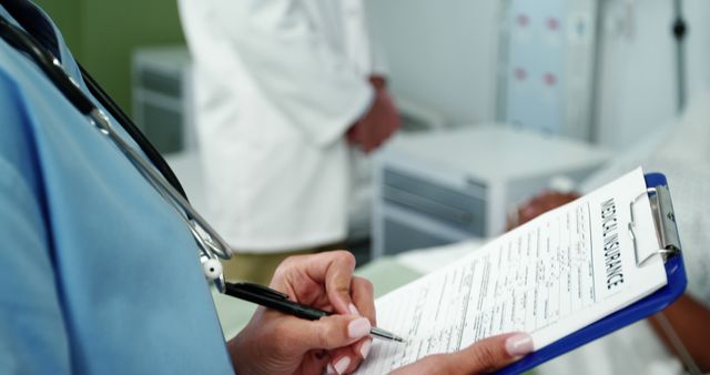 Female doctor filling medical insurance form at the hospital 4k - Download Free Stock Photos Pikwizard.com