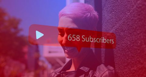 Young woman growing social media subscriber base with smartphone
