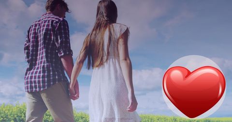 Romantic Couple Strolling Hand in Hand with Heart Icon Overlay