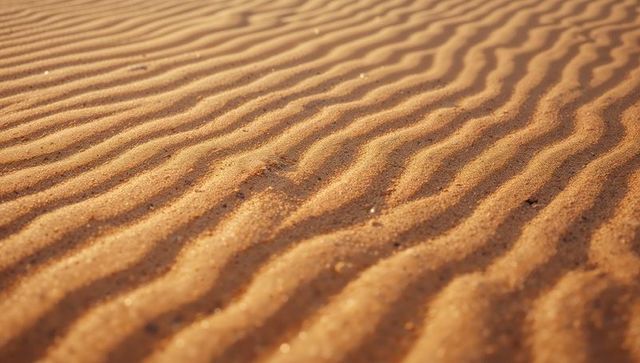 Serene Sand Patterns in Windswept Desert Dunes