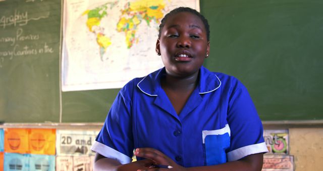 Female Student in Blue Uniform Studying in Classroom - Download Free Stock Images Pikwizard.com