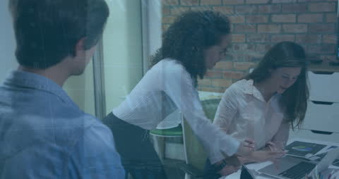 Team Collaborating in Modern Office with Digital Technology