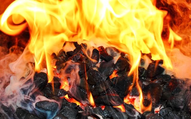 Closeup of Burning Coal with Intense Flames and Smoke - Download Free Stock Photos Pikwizard.com