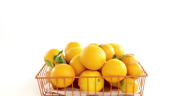 Fresh Personally Picked Oranges in Wire Basket on White Background - Download Free Stock Images Pikwizard.com