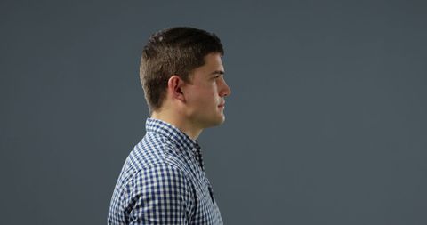 Young Man in Profile With Calm and Thoughtful Demeanor - Download Free Stock Images Pikwizard.com