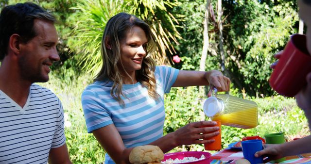 Friends Enjoying Outdoor Picnic and Refreshments - Download Free Stock Images Pikwizard.com