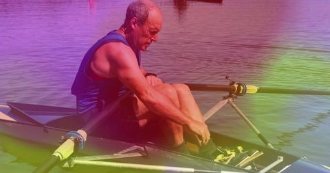 Rower in Racing Shell on Serene Lake Adjusting Footwear
