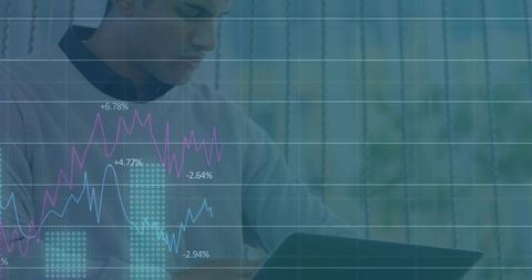 Professional Man Analyzing Data on Tablet with Futuristic Graph Overlays