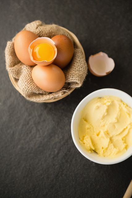 Overhead view of butter and eggs in bowls - Download Free Stock Photos Pikwizard.com