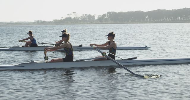 Women's Rowing Crew Training on Calm River at Sunset - Download Free Stock Images Pikwizard.com