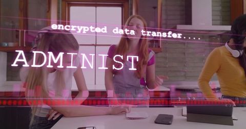 Young women collaborating on phones and tablet at kitchen island with cybersecurity overlay