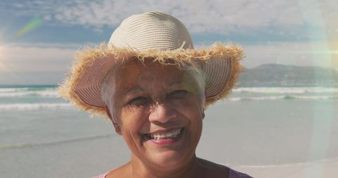 Senior Woman Blissfully Enjoying the Sunny Beach