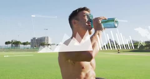 Shirtless athlete hydrating after training on field while health charts tracking progress