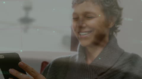 Smiling Woman Interacting with Digital Data Overlay
