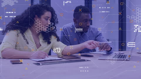 Diverse Professionals Engaged in Data Analysis Meeting