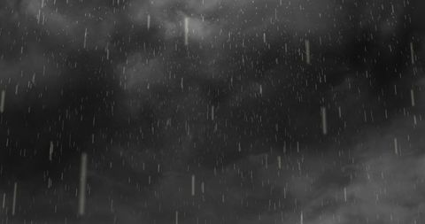 Heavy rainfall under dark stormy clouds with lightning