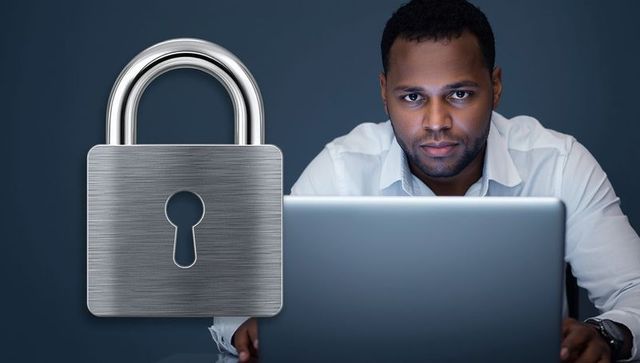 Cybersecurity focused worker with padlock symbol for privacy