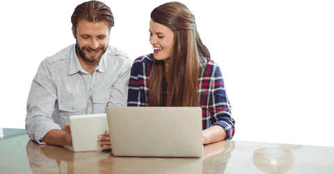 Caucasian Couple Using Tablet and Laptop on Transparent Background - Download Free Stock Videos Pikwizard.com