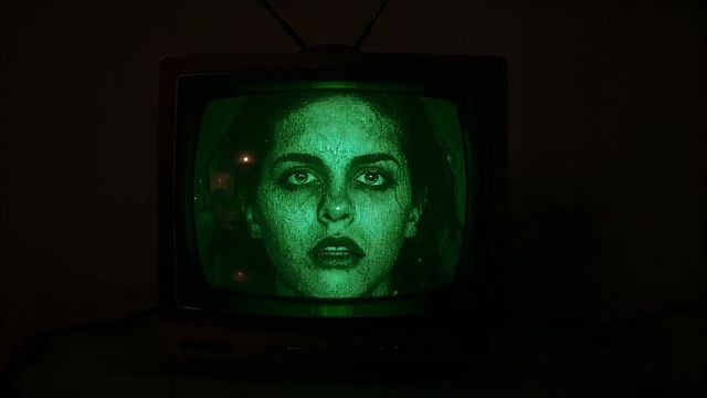 Spooky Green Face on Vintage TV