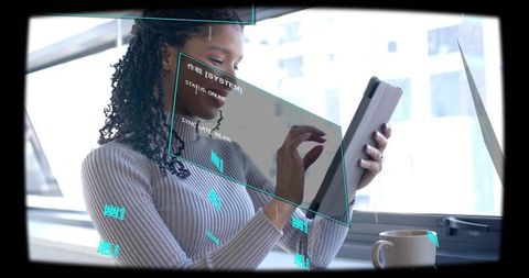 Woman tapping tablet with holographic AR interface in sunlit city office environment