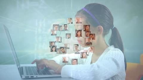 Woman Engaging with Networking Connections on Laptop