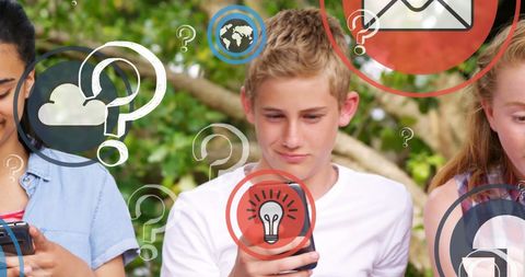 Diverse Students Engaged with Digital Technology Outdoors