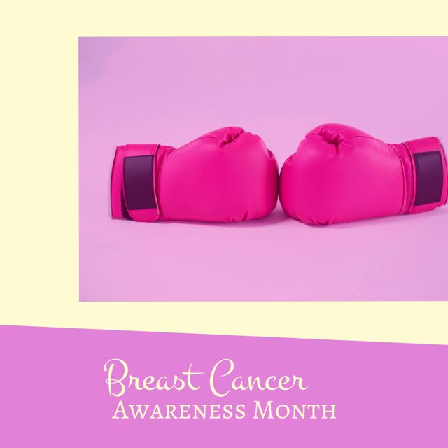 Composition of breast cancer awareness month over pink boxing gloves on purple background. Breast cancer awaresess month and celebration concept digitally generated image.