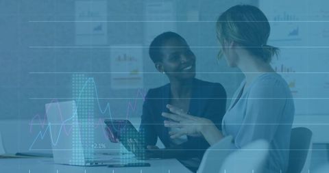 Professional colleagues engaging in business discussion with technology