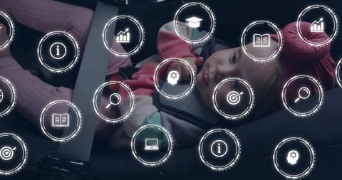 Infant secured in car seat with digital interface icons overlay