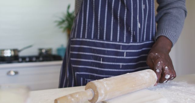 Man Preparing Dough with Rolling Pin in Kitchen - Download Free Stock Images Pikwizard.com