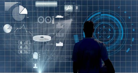 Athlete Analyzing Data on Large Futuristic Display Screen