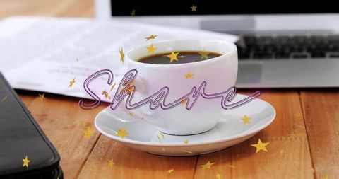 Coffee Cup Next to Laptop and Documents on Wooden Workspace