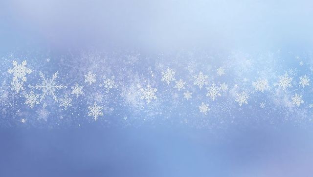 Drifting snowflakes sparkling over frosted blue bokeh background with soft glitter haze