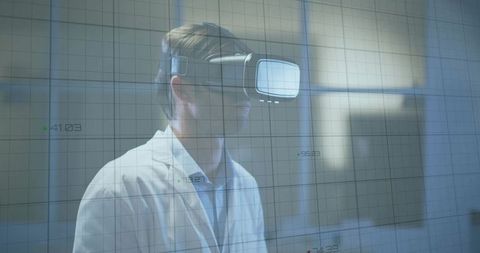 Scientist Using VR Headset for Virtual Data Analysis in Laboratory