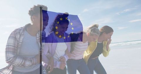 Joyful Friends Walking Together on Sunny Beach with EU Symbol