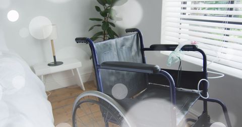Cozy Interior Featuring Wheelchair with Gentle Light Effects - Download Free Stock Images Pikwizard.com