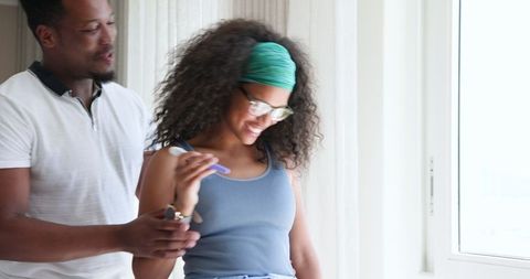 Celebrating pregnancy news in bright home setting