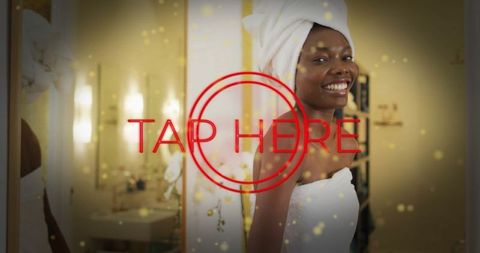 Smiling woman in towel enjoying wellness routine at spa