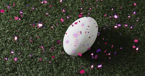 Rugby Ball on Grass with Celebratory Confetti - Download Free Stock Images Pikwizard.com