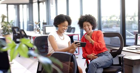 Two African American Women Collaborating in Modern Office - Download Free Stock Images Pikwizard.com