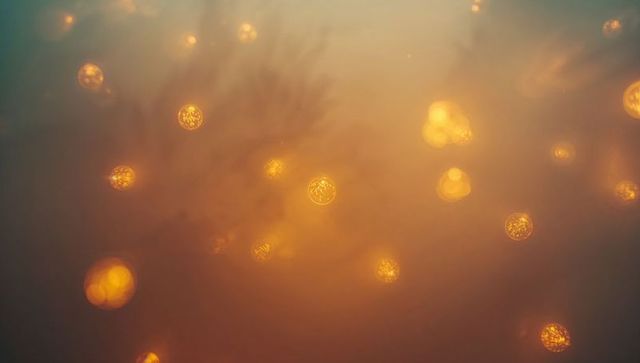 Enchanted Golden Orbs in Ethereal Abstract Haze