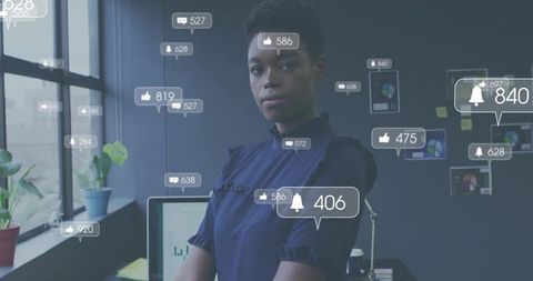 Confident professional standing with arms folded amid social media analytics notifications