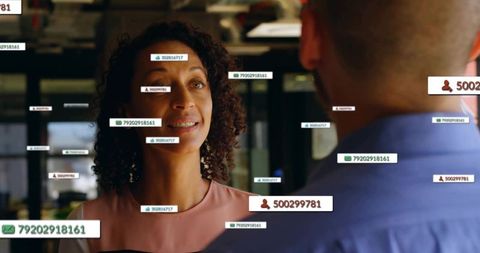 Curly-haired Professional With Digital Overlay in Modern Office Setting