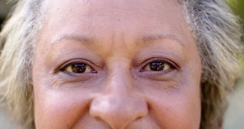 Close-Up of Joyful, Wise Senior Woman's Eyes