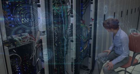 Cybersecurity Engineer Overseeing Server Operations with Digital Interface - Download Free Stock Images Pikwizard.com