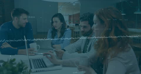 Diverse Business Team Collaborating on Financial Analysis