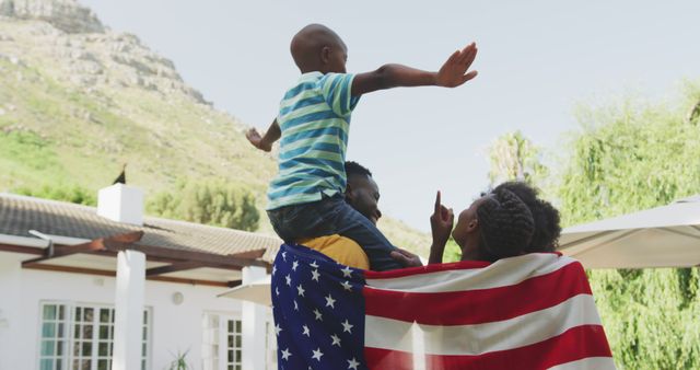 African American Family Celebrating Fourth of July Outdoors with American Flag - Download Free Stock Images Pikwizard.com