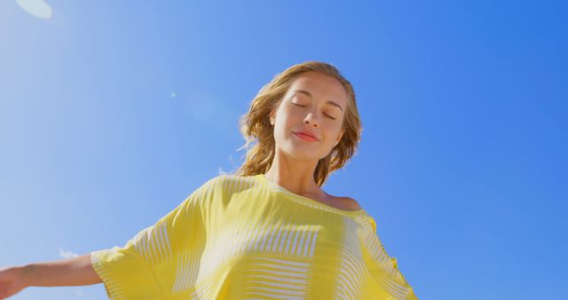 Content Young Woman Enjoying Sunshine on Beautiful Sunny Day - Download Free Stock Images Pikwizard.com